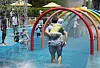Children and adults frolic in a pool facility in eastern Seoul on June 28.