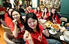 Supporters of Korean football team enjoy a World Cup match at a fried chicken eatery in central Seoul on June 25.