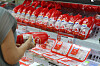 A consumer buys a processed chicken at a supermarket in Seoul on June 24.