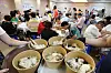 Samgyetang (chicken soup) is distributed to older adults at a community center in Busan on July 30, 2025.