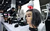 Medical and cosmetic products to treat hair loss are displayed at an exhibition in western Seoul on April 12.