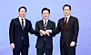 From left, SK Group Chairman Chey Tae-won, President Lee Jae Myung, and Samsung Electronics Executive Chairman Lee Jae-yong join hands after $520 billion investments for four new chip plants at the Blue House in Jongno District, central Seoul, on June 29.