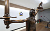 A bronze statue symbolizing justice is seen in a courtroom in Ansan, Gyeonggi, on June 9.