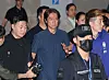 Hong Myung-bo walks through Incheon airport with several people around him.