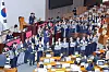 Opposition People Power Party lawmakers hold pickets while protesting against ruling Democratic Party's decision over parliamentary committee allocation at the National Assembly in western Seoul on June 30.