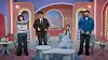 Four people pose on a pastel studio set with arched backdrops, round tables, and lounge seating for Netflix's Better Late Than Single.