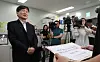Gwangju Jeil High School's principal Lee Kyu-yeon files an official complaint at the Korea Baseball Softball Association in southern Seoul on June 30.