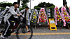 Funeral wreaths are set up in front of Paichai High School in Gangdong District, eastern Seoul, on July 2.