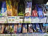 Convenience store shelves stocked with assorted protein bars in Mapo District, Seoul.