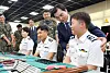 Defense Minister Ahn Gyu-back, right, encourages cadets at Republic of Korea Air Force Academy in North Chungcheong on June 15.
