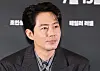 Jo In-sung smiles at a press event backdrop for the film 'Hope' in Seoul.