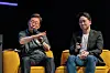 Tekken pro-gamer Bae Jae-min, right, sits with then-presidential candidate Lee Jae Myung during a town hall meeting about esports held in Gwangju in 2025.