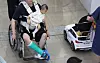 A father in a wheelchair browses childcare products with his child at an exposition held in Daegu on Aug. 28, 2025.