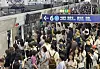 Subway passengers crowd the boarding platform at Yongsan Station in central Seoul on July 8.