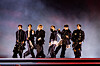 BTS performs on a stage in central Seoul on March 21.