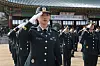 Cadets salute during a graduation ceremony held at the Korea Military Academy in northern Seoul on Feb. 27.