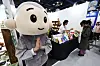A life-size mascot of a monk welcomes visitors at the 2026 Seoul International Buddhism Expo held in southern Seoul on April 2.