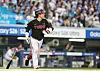 LG Twins catcher Park Dong-won runs after hitting a homer against the Samsung Lions in Daegu on July 7.