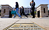 People walk in front of the Constitutional Court in central Seoul on March 25.