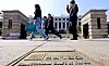 People walk in front of the Constitutional Court in central Seoul on March 25.