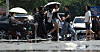 People cross motor road in Daegu when heat wave warning was placed on July 11.