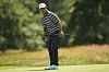 Tom Kim reacts after missing a putt on the second hole during the final round of the U.S. Open golf tournament at Shinnecock Hills Golf Club in Southampton, on June 21.