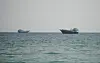 Vessels in the Strait of Hormuz are seen from Oman on July 12.