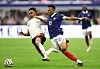 Kylian Mbappe of France, right, competes for the ball against Lamine Yamal of Spain during the FIFA World Cup 2026 semifinal match between France and Spain at Dallas Stadium on July 14.