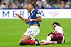 Spain's Lamine Yamal, right, and France's Kylian Mbappe fall during a FIFA World Cup 2026 semifinal match in Arlington, Texas, near Dallas, July 14.