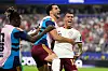 Spain's Pedro Porro, right, celebrates with Mikel Merino and Nico Williams, left, after scoring his side's second goal during the FIFA World Cup 2026  semifinal match between France and Spain in Arlington, Texas, near Dallas, on July 14.