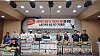 People hold a press conference to protest employment contract for foreign workers HD Hyundai Heavy Industries in an undated photo.