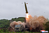 A projectile is seen launched in a photo carried by Korean Central News Agency on May 27.