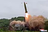 A projectile is seen launched in a photo carried by Korean Central News Agency on May 27.