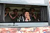 Kim Jong-un, accompanied by military soldiers, observes a military weapon test in a photo carried by Korean Central News Agency on June 26.