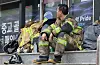 A firefighters is seen at the site of Coupang warehouse fire in Incheon on July 20.