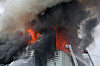 Coupang’s No.32 logistics center in Seongnam-dong, Seohae District, Incheon, is seen caught in flames on July 20.