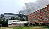 Black smoke is seen arising from Coupang's No. 32 logistics center in Incheon on July 20.