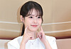 Singer and actor IU poses for photograph at a cosmetics event held in southern Seoul on Feb. 26.