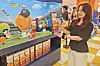 A person holds a package of kitchen sponges produced in collaboration with the Lotte Giants at a department store in Busan on Aug. 11, 2025.