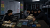 A generative AI-created image depicts a scene where voice phishing scammers exploit the criminal proceeds. The image was jointly produced by Perplexity and ChatGPT.