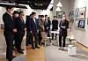 Now-Samsung Electronics Chairman Lee Jae-yong, far left, inspects a service-robot at Seoul R&D Campus in Seocho District, southern Seoul, in 2020.