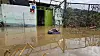 A house in Asan is seen flooded on July 22.