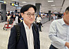 Industry Minister Kim Jung-Kwan arrives at Dulles International Airport in Virginia on July 22.