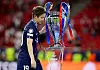 Paris Saint-Germain's Lee Kang-in celebrates with the trophy after winning the UEFA Champions League on May 31.