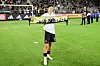 Son Heung-min of the Los Angeles FC poses with the man of the match scarf after the team's win against the Real Salt Lake at BMO Stadium on July 22 in Los Angeles, California.