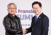 Lee Jae-myung and Jensen Huang shake hands in front of a Francium Summit backdrop.