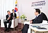 South Korean President Lee Jae-myung speaks with Broadcom CEO Hock Tan during a hotel meeting in San Francisco.