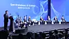 South Korean President Lee Jae-myung speaks at a San Francisco AI summit as panelists sit onstage behind him.