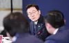 President Lee Jae Myung listens as participants of a tech-related gathering speak in San Francisco on July 25.