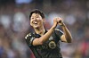 Son Heung-min of Los Angeles FC celebrates after scoring the team's first goal during the MLS match against Sporting Kansas City at BMO Stadium on July 25 in Los Angeles, California.